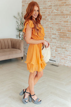 Stuck in My Head Tiered Dress in Orange - Molliee Boutique